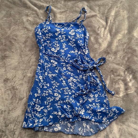 blue and white dress with a wrap-around waist - Picture 1 of 3